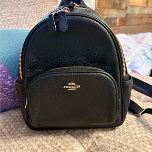 Coach Black Leather Backpack with Gold Accents
